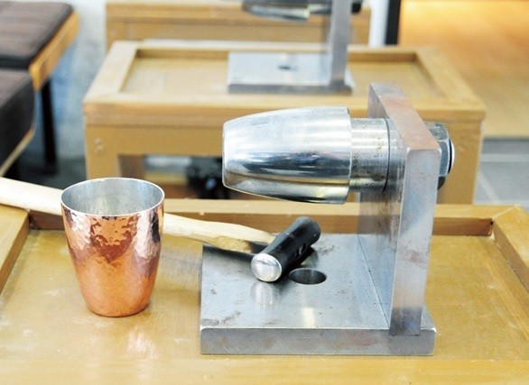 Create hammered patterns on a copper beer cup